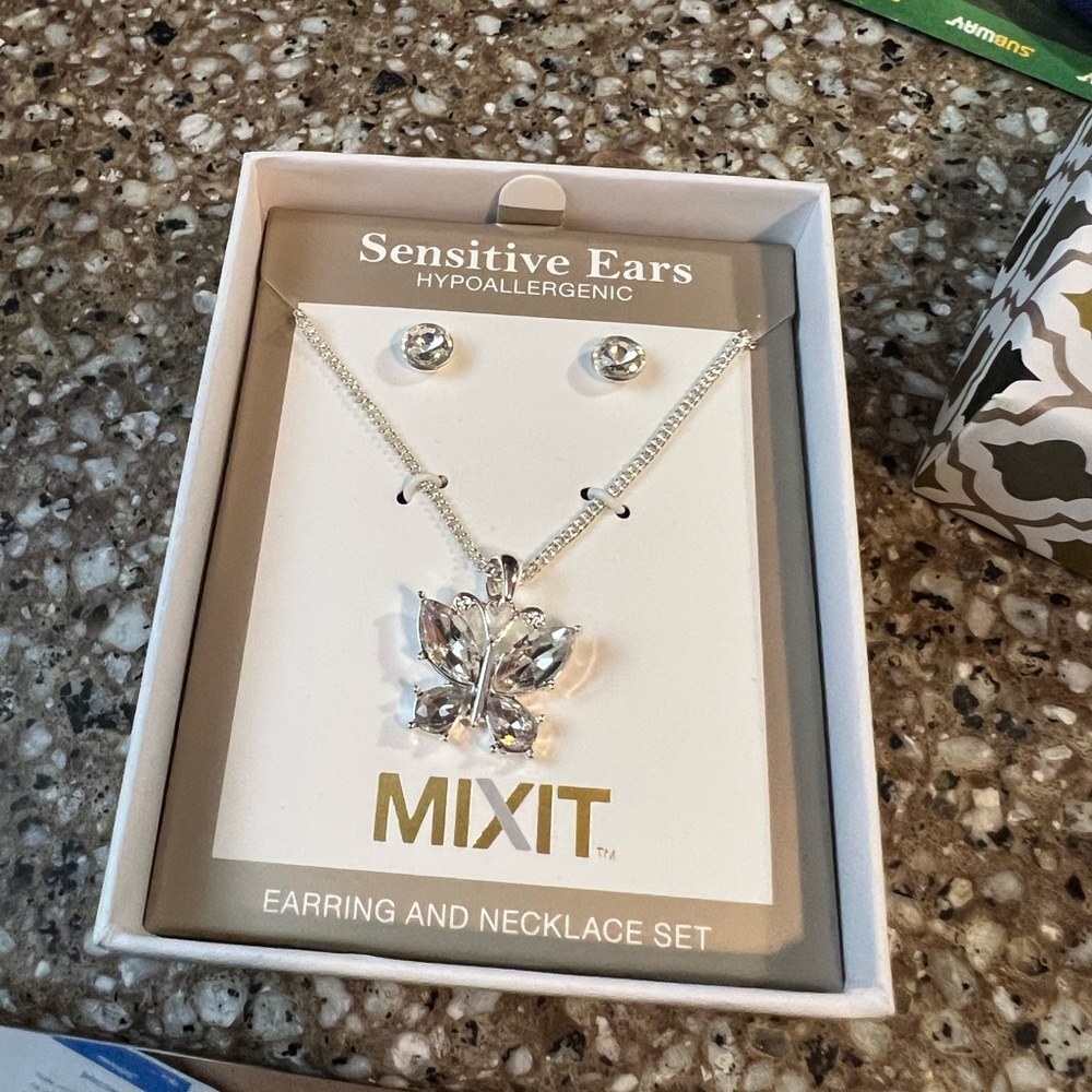 Butterfly necklace and earrings set never used brand new in the box
